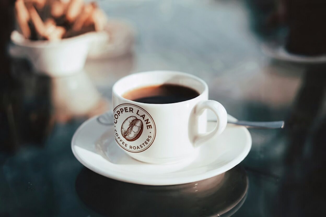 Copper Lane coffee cup with logo